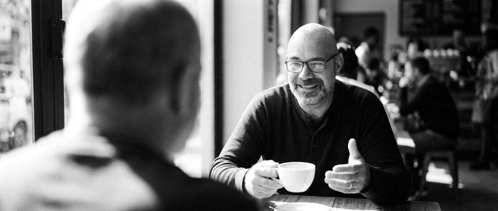 Albert sipping an espresso in a Pretoria coffee shop